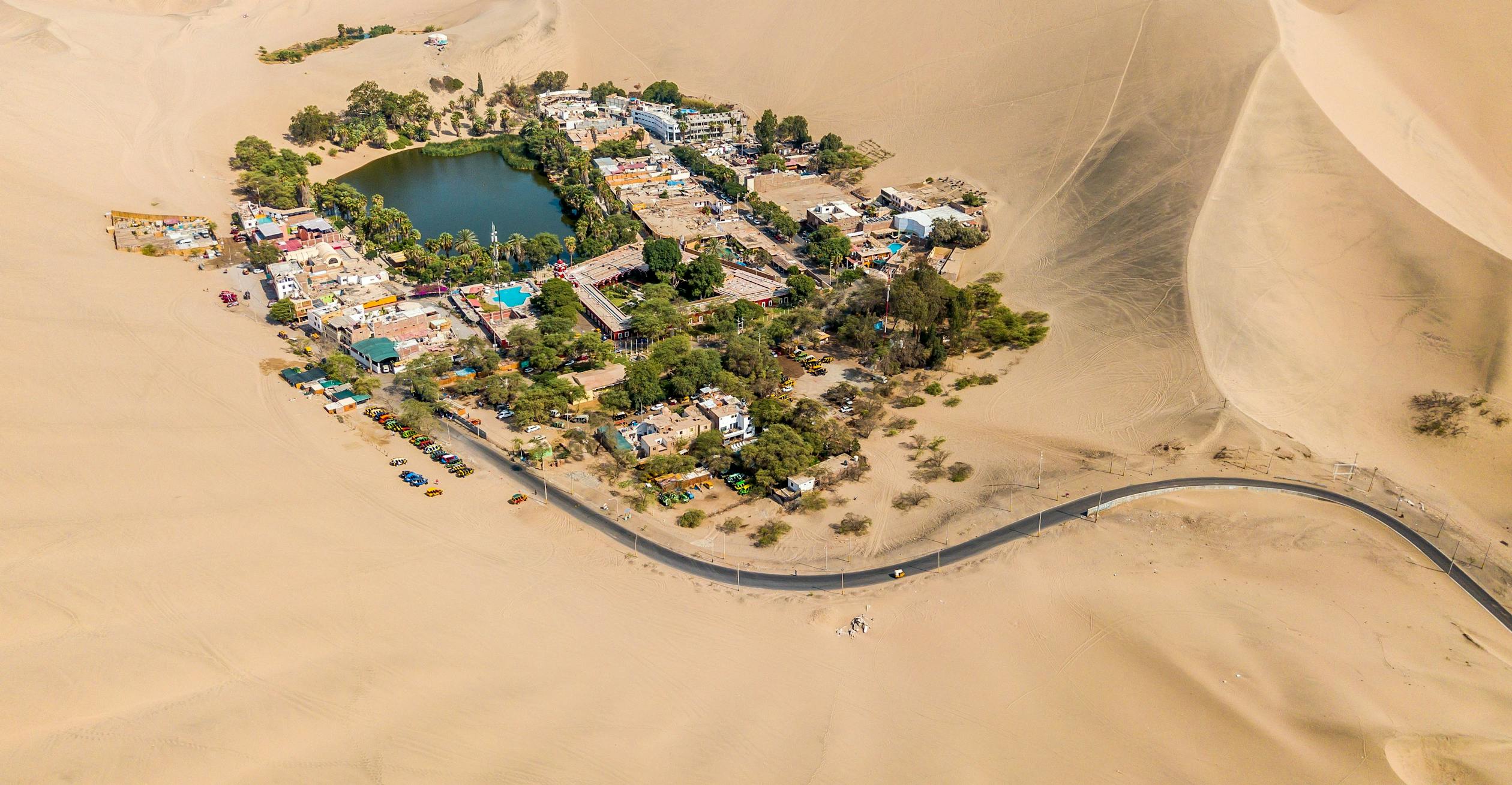 Huacachina oasis surrounded by dunes