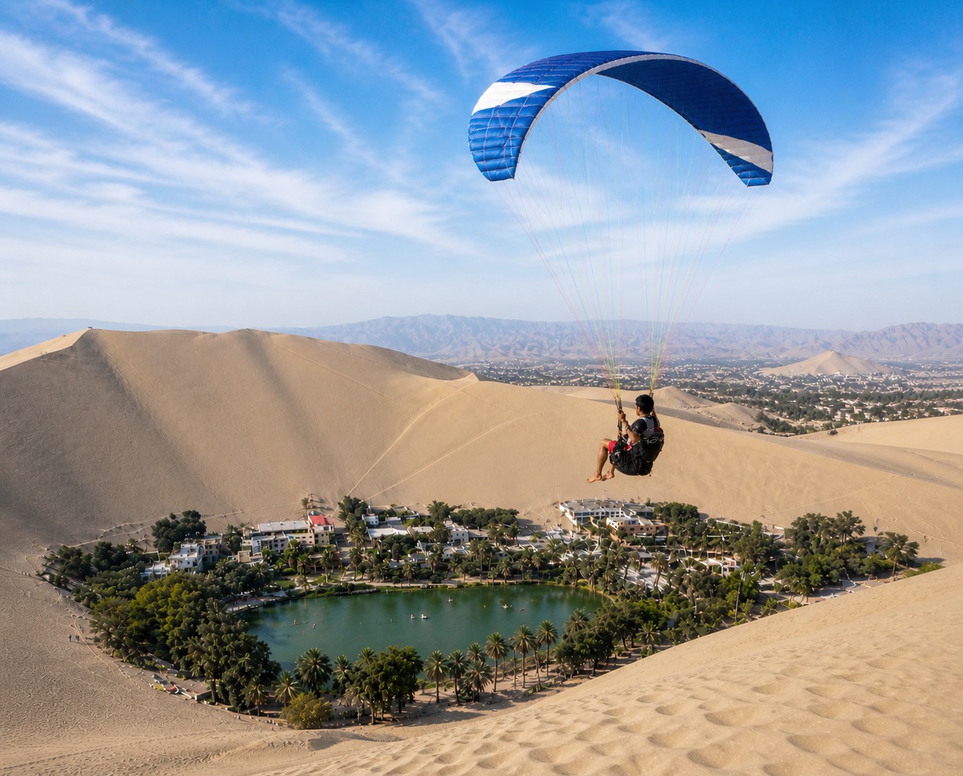 Paragliding above the desert near Huacachina