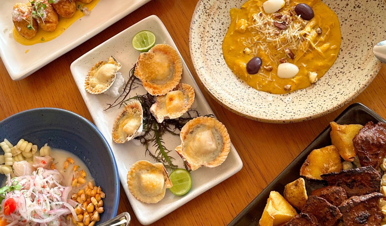Plates of ceviche, seafood and Peruvian dishes in Lima